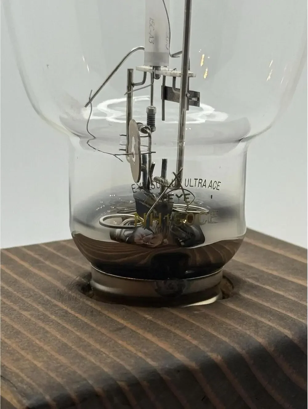 Vintage Retro High Pressure Sodium Industrial Bulb Display on Wood Pedestal
